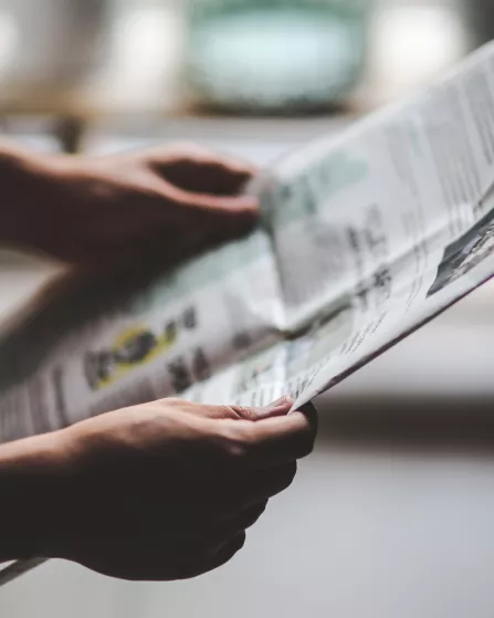 reading newspaper wallpaper 2560x1440